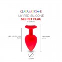 My red silicone secret plug medium