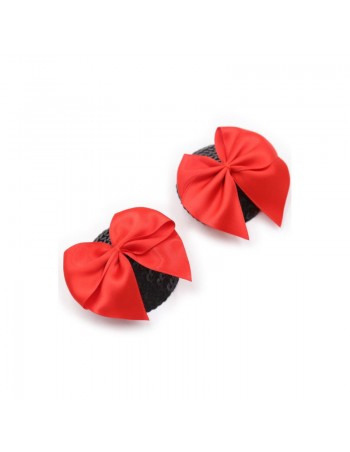 Paire de cache tétons adhésifs noir avec nœud papillon rouge 