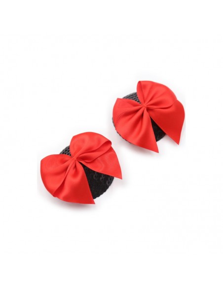 Paire de cache tétons adhésifs noir avec nœud papillon rouge 